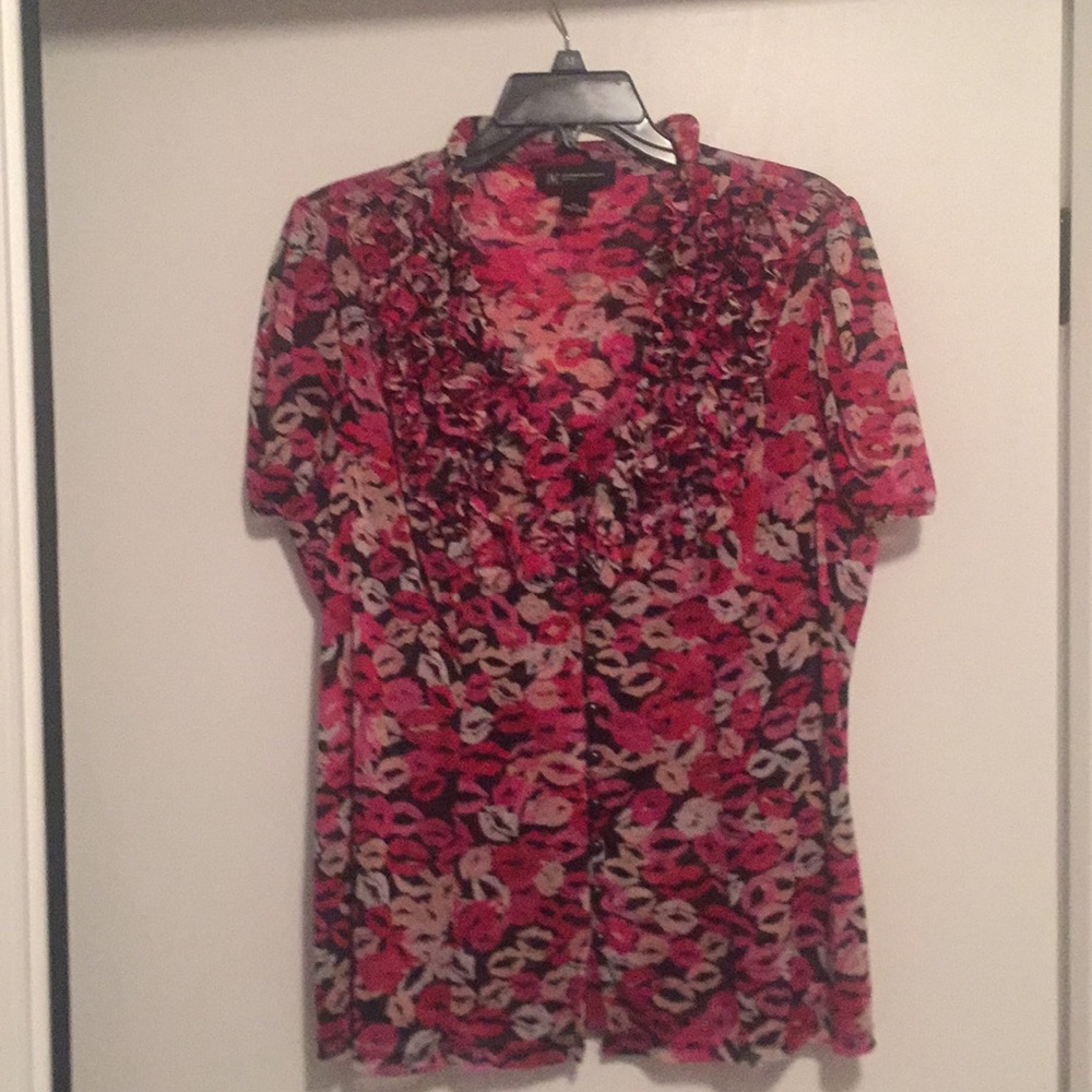 Blouse with lips designed into fabric